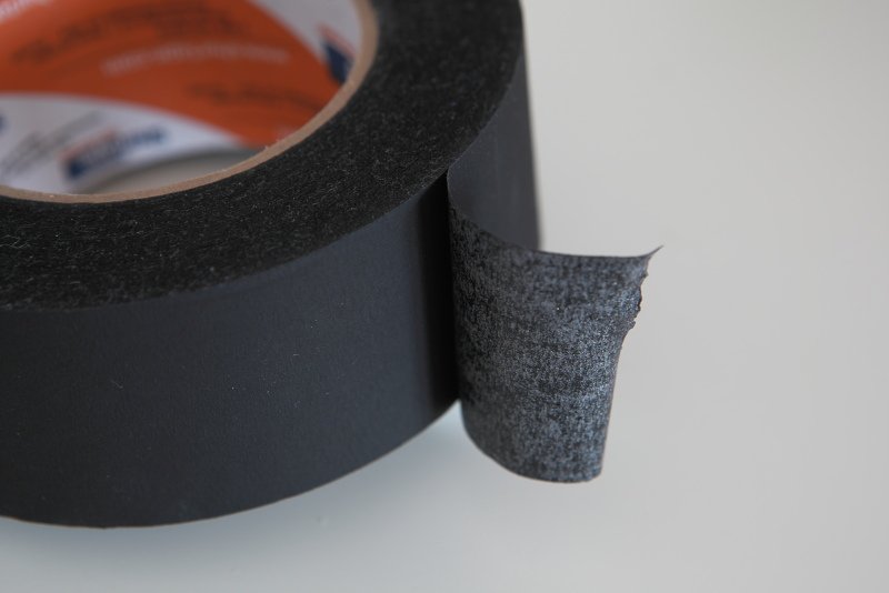 Black masking tape you can use to cover up device and appliance lights when lightproofing a darkroom