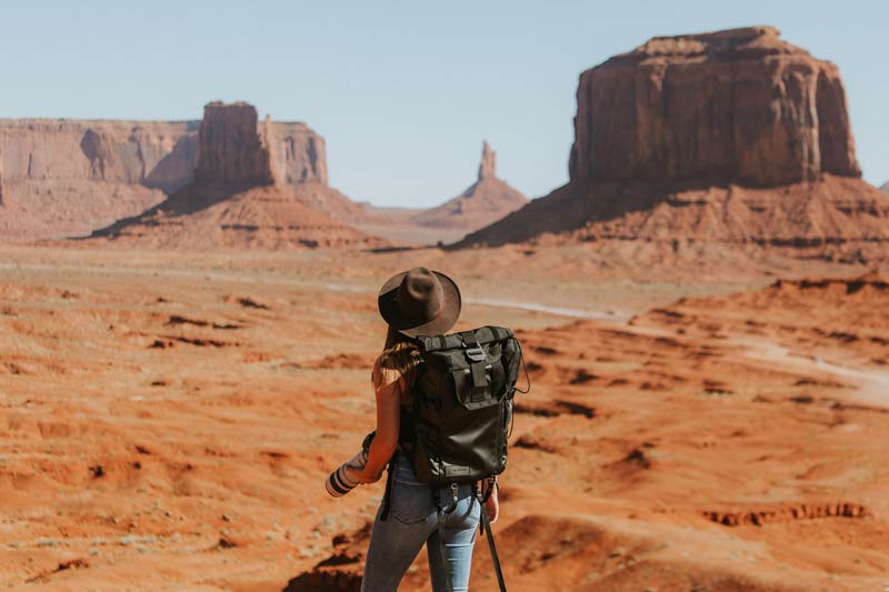 Photographer in a desert canyon off-the-grid